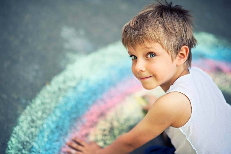 boy-making-chalk-rainbow-800w